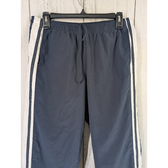 Under Armour Size Medium Dark Blue White Stripe Active Windbreaker Crop Pants - Picture 3 of 7